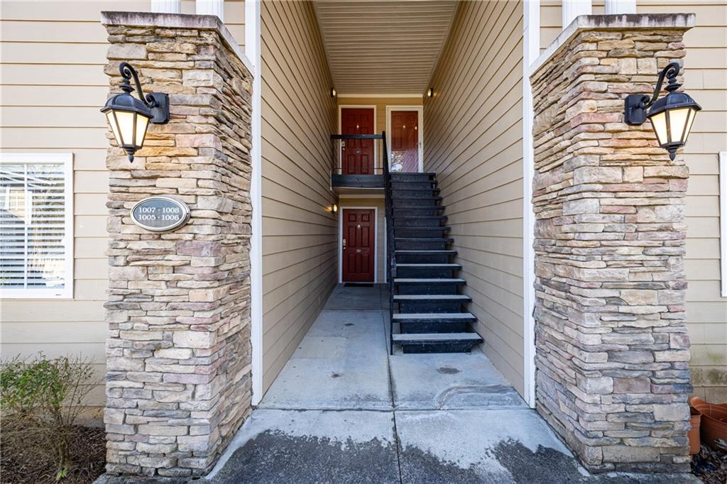 1468 Briarwood Road Northeast, Unit 1005 Atlanta, GA 30319 - Photo 39 of 45 a view of entryway with brick walls