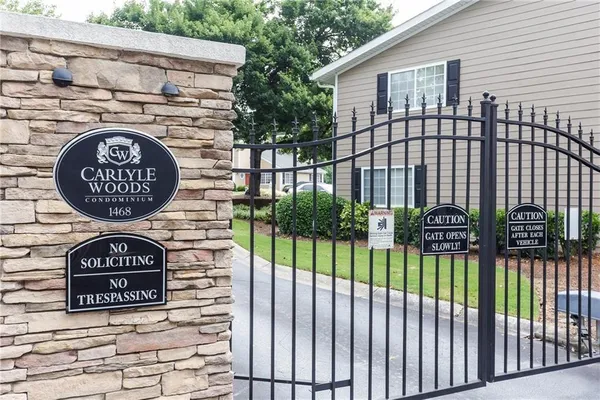 a view of a street sign of a house