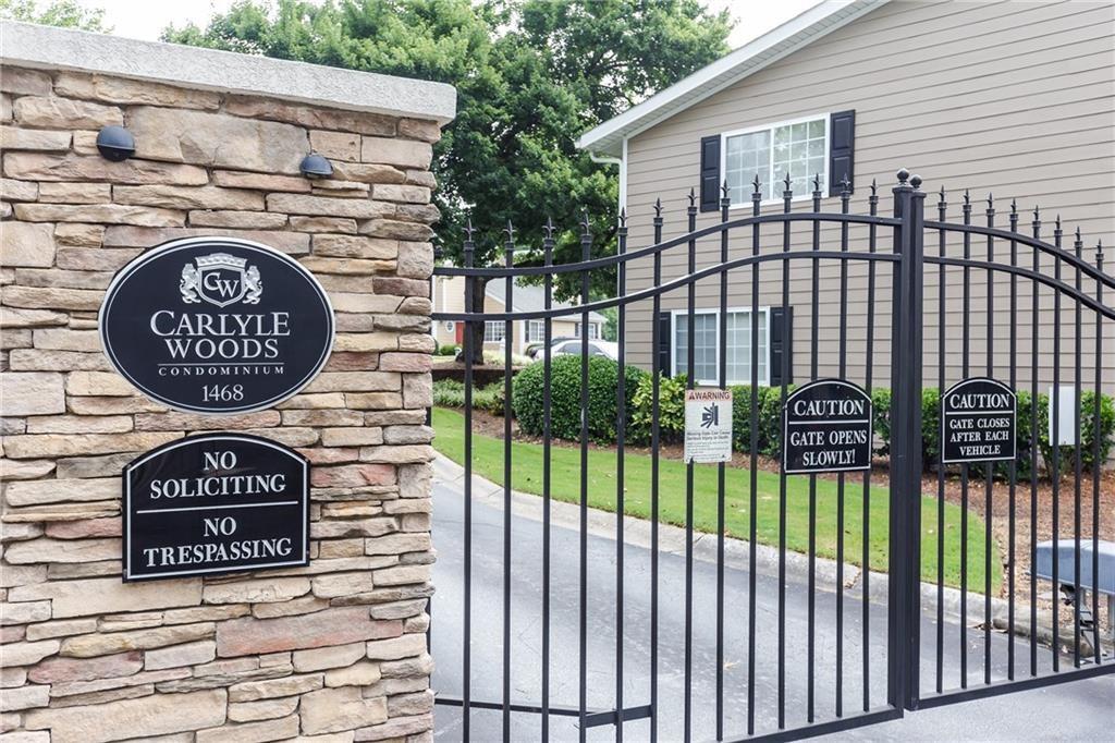 1468 Briarwood Road Northeast, Unit 1005 Atlanta, GA 30319 - Photo 4 of 45 a view of a street sign of a house