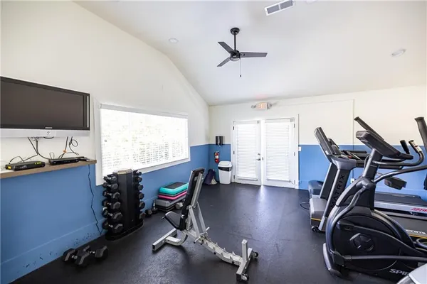 a view of a swimming pool with a patio