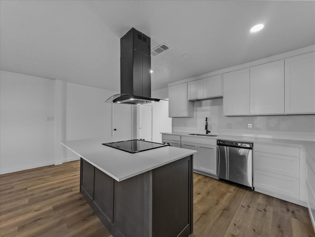 1236 Harrison Lane Hurst, TX 76053 - Photo 4 of 25 a kitchen with stainless steel appliances granite countertop a sink stove and refrigerator