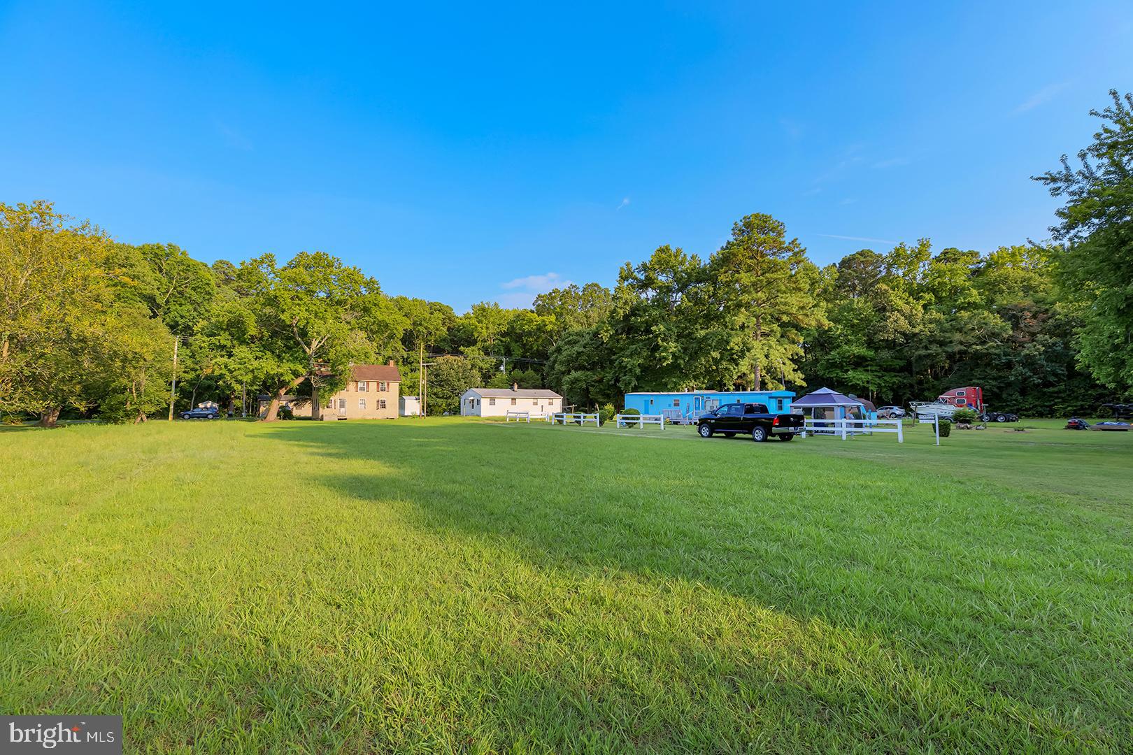 4152 Jesterville Road Tyaskin, MD 21865 - Photo 5 of 21 a front view of a house with a yard