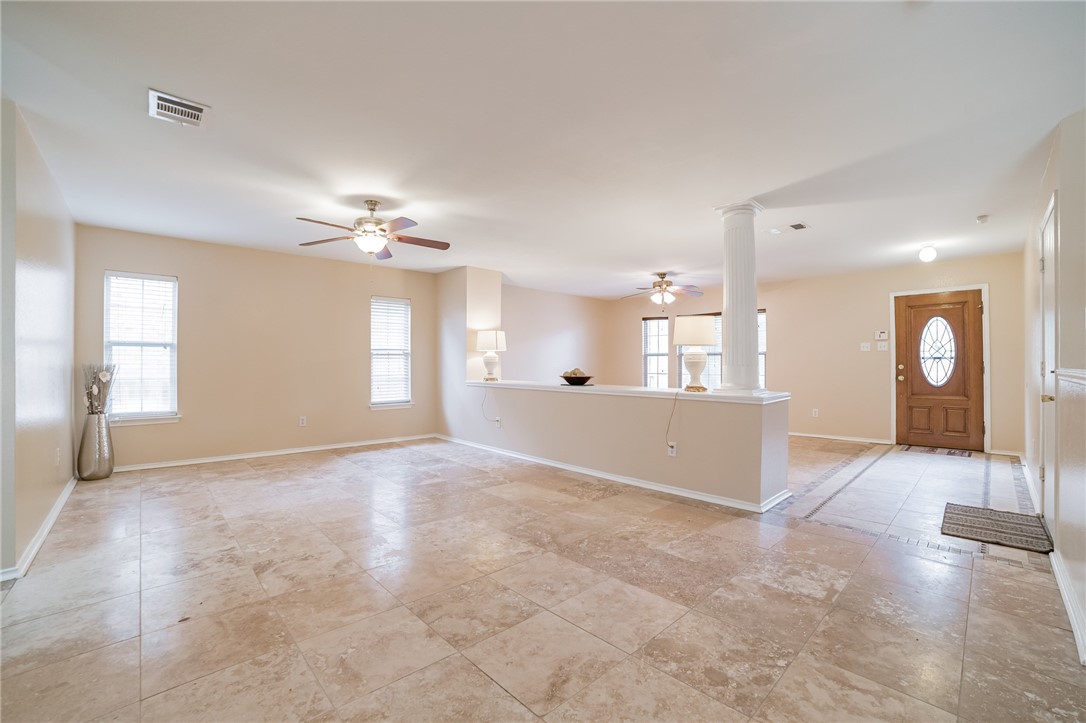 11228 Pickard Lane Austin, TX 78748 - Photo 5 of 32 a view of a kitchen with a sink and a chandelier