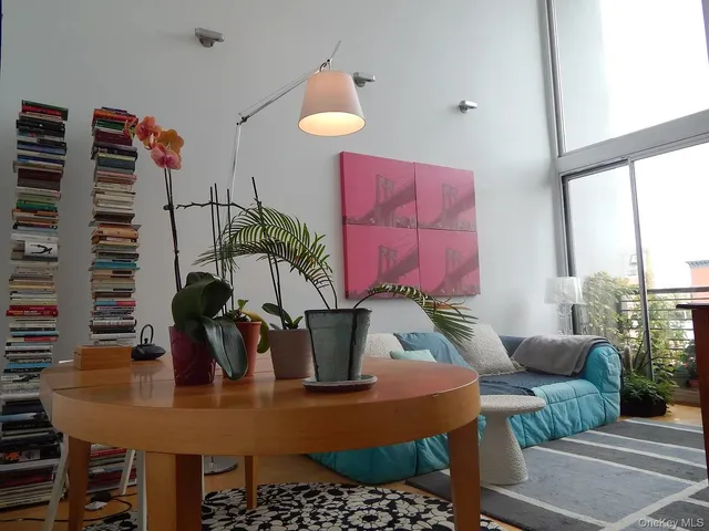 a living room with furniture and window