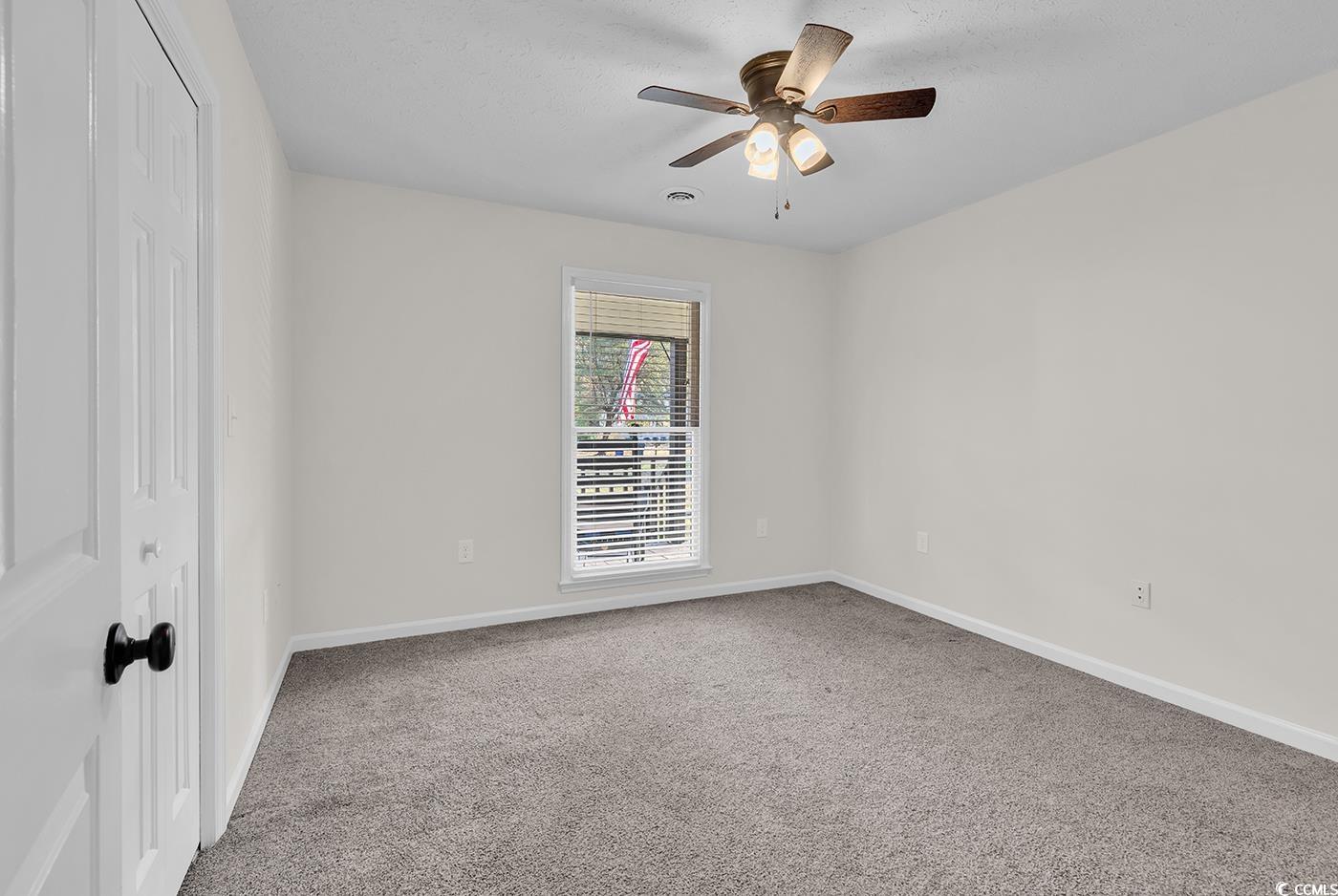 506 Merrywood Drive Conway, SC 29526 - Photo 20 of 40 Unfurnished room with light carpet and ceiling fan