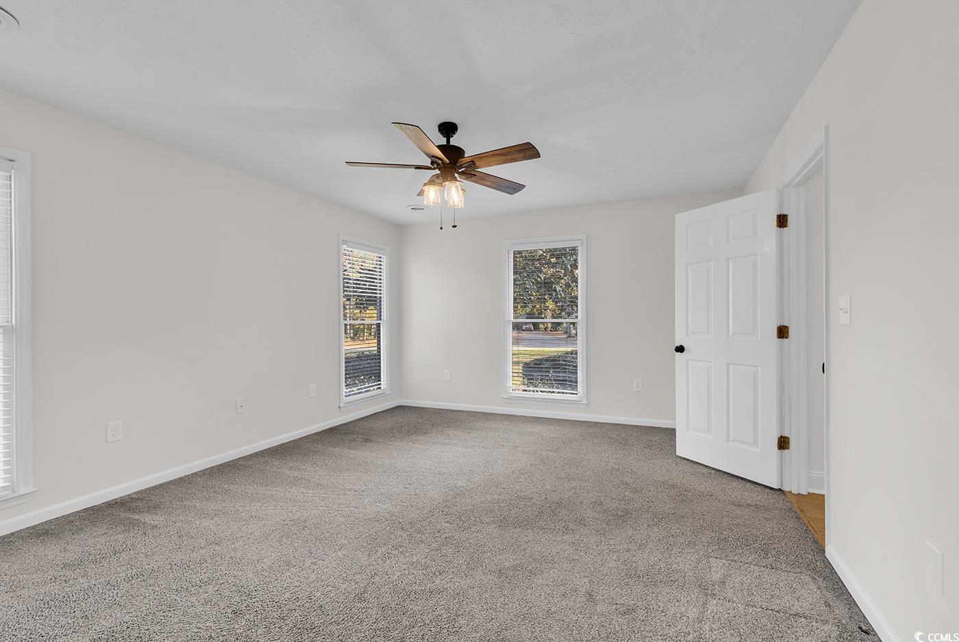 506 Merrywood Drive Conway, SC 29526 - Photo 26 of 40 Unfurnished room with light carpet and ceiling fan