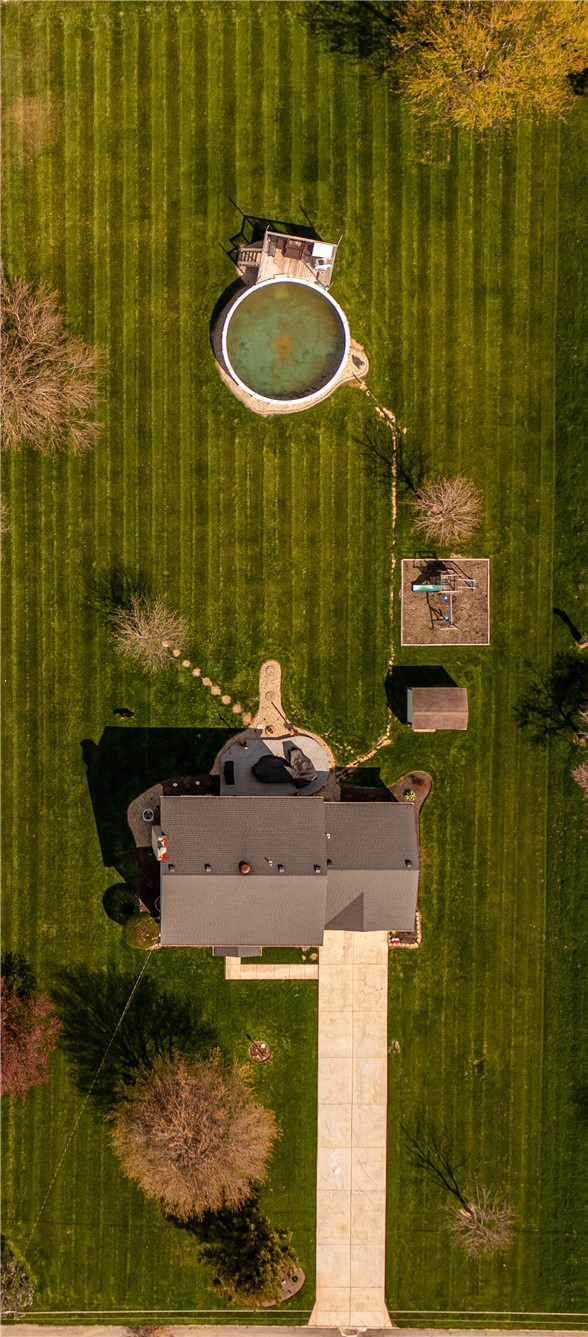 3628 Petre Road Springfield, OH 45502 - Photo 48 of 52 An aerial view captures the home's grounds with a pool, shed, and driveway.