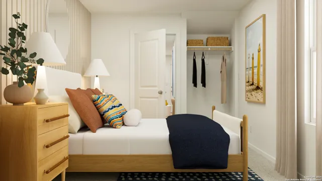 a bedroom with a bed and a couch