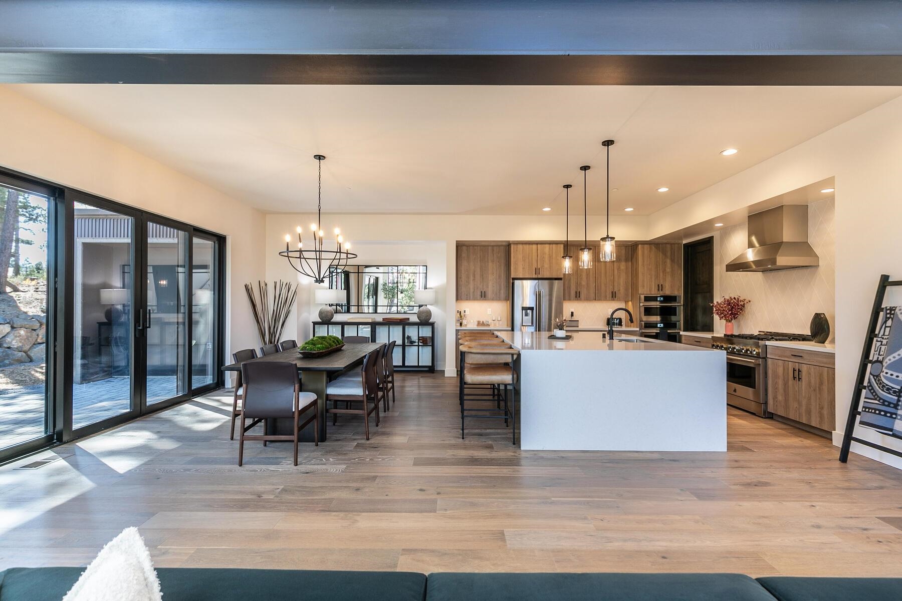 10244 Modane Place Truckee, CA 96161 - Photo 12 of 21 a living room with stainless steel appliances kitchen island granite countertop furniture and a kitchen view
