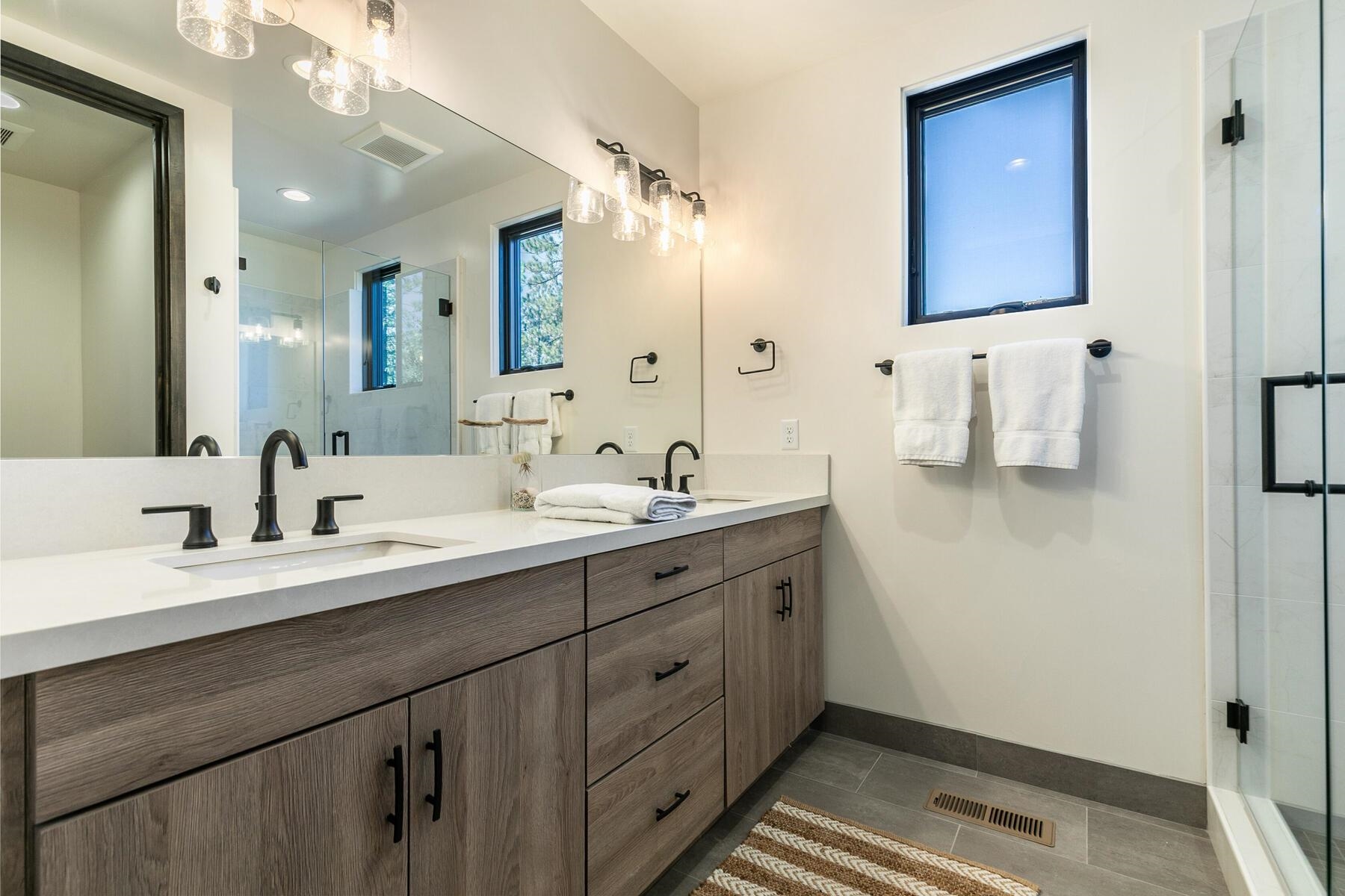 10244 Modane Place Truckee, CA 96161 - Photo 14 of 21 a bathroom with a double vanity sink mirror and