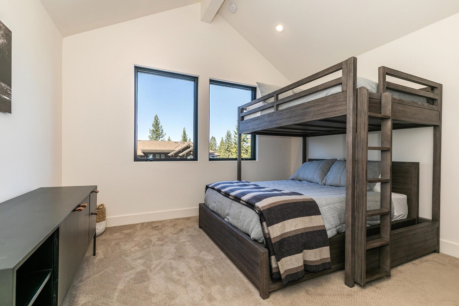 10244 Modane Place Truckee, CA 96161 - Photo 18 of 21 a bedroom with a bed and a dresser