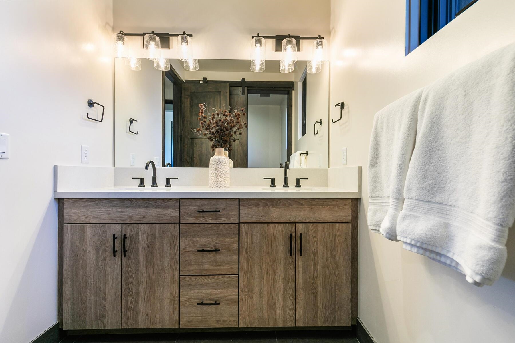 10244 Modane Place Truckee, CA 96161 - Photo 19 of 21 a bathroom with a double vanity sink and a mirror