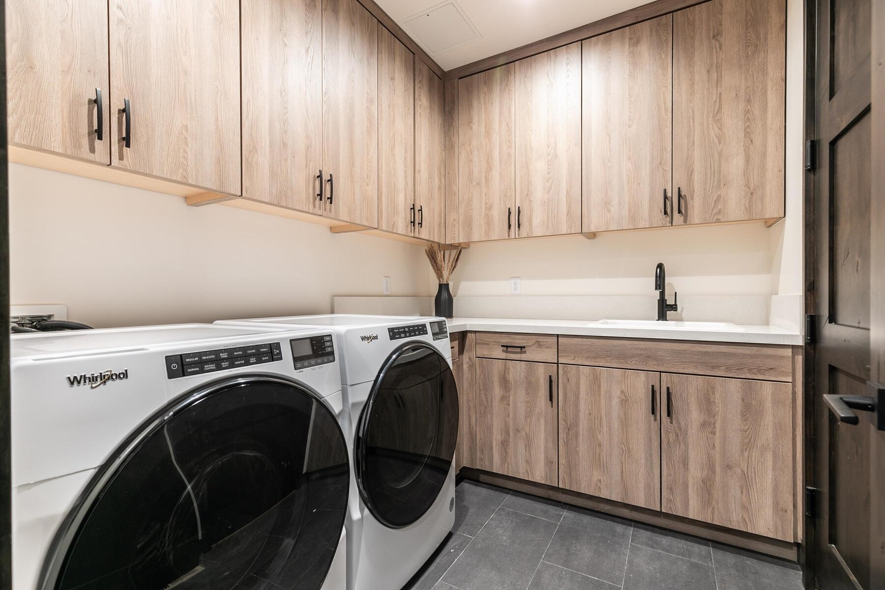 10244 Modane Place Truckee, CA 96161 - Photo 21 of 21 a utility room with dryer and washer