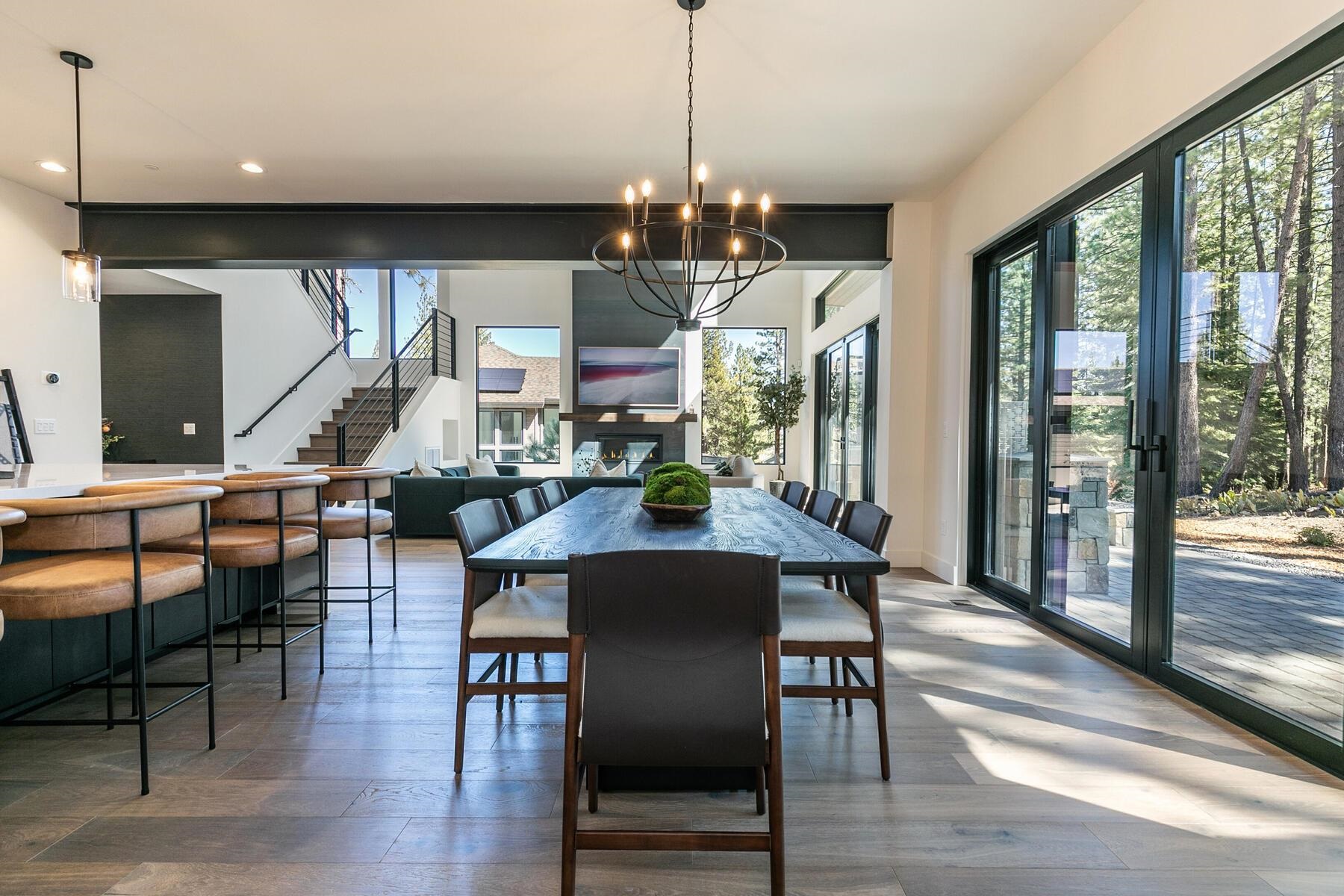 10244 Modane Place Truckee, CA 96161 - Photo 9 of 21 a view of a dining room with furniture window and wooden floor
