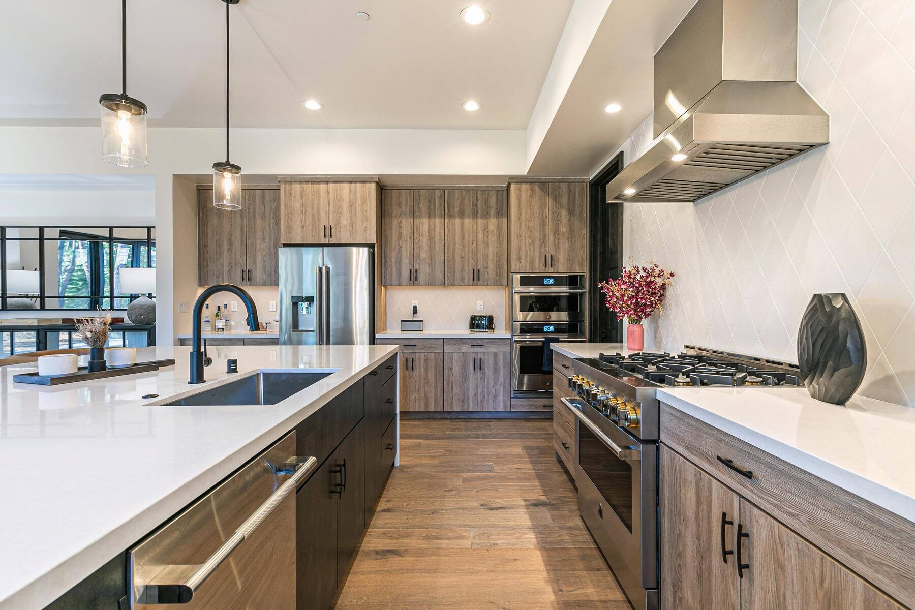 10244 Modane Place Truckee, CA 96161 - Photo 10 of 21 a kitchen with kitchen island granite countertop a sink stainless steel appliances and cabinets