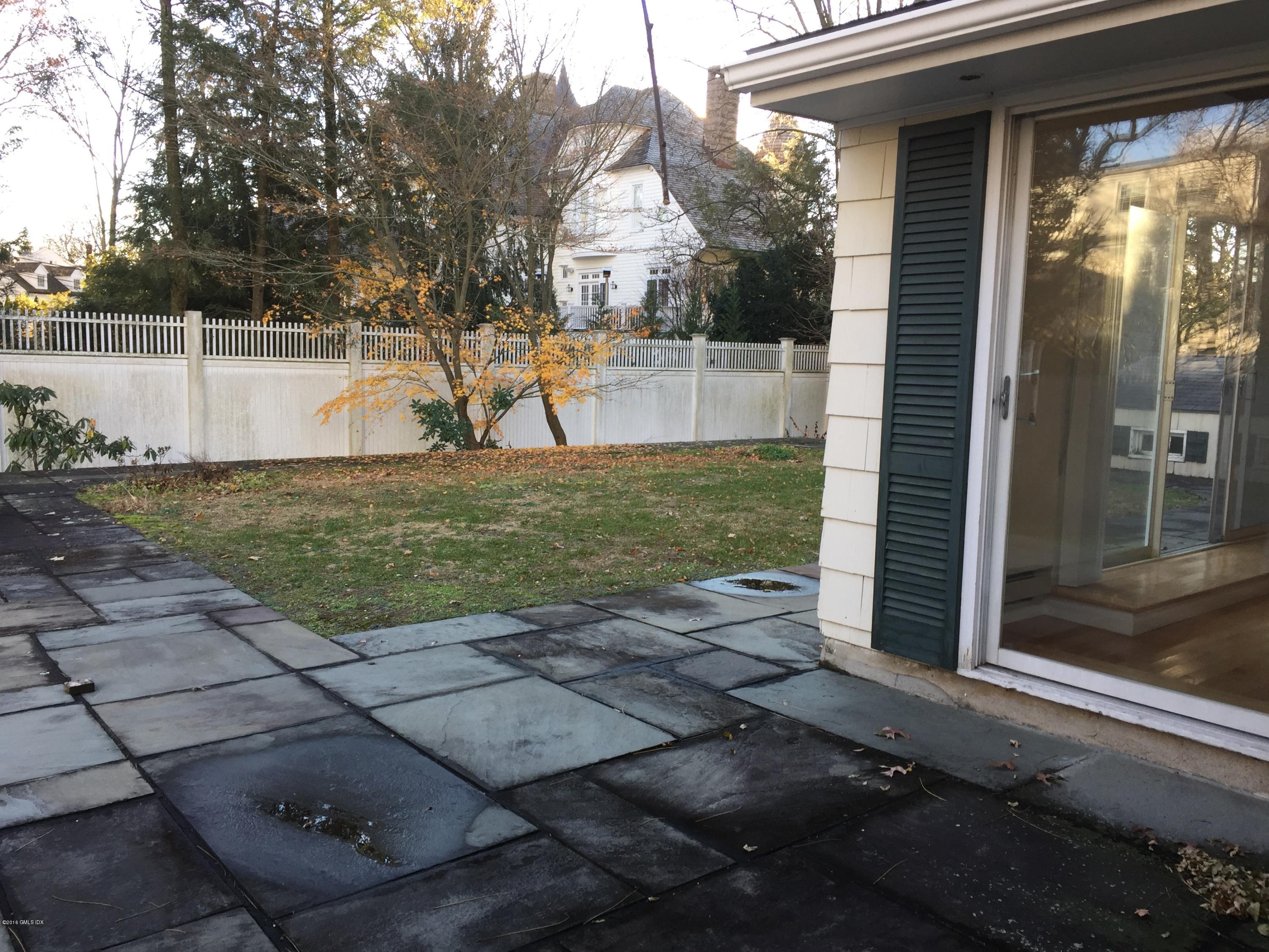 10 Miltiades Avenue Riverside, CT 06878 - Photo 12 of 16 a view of a house with backyard and porch