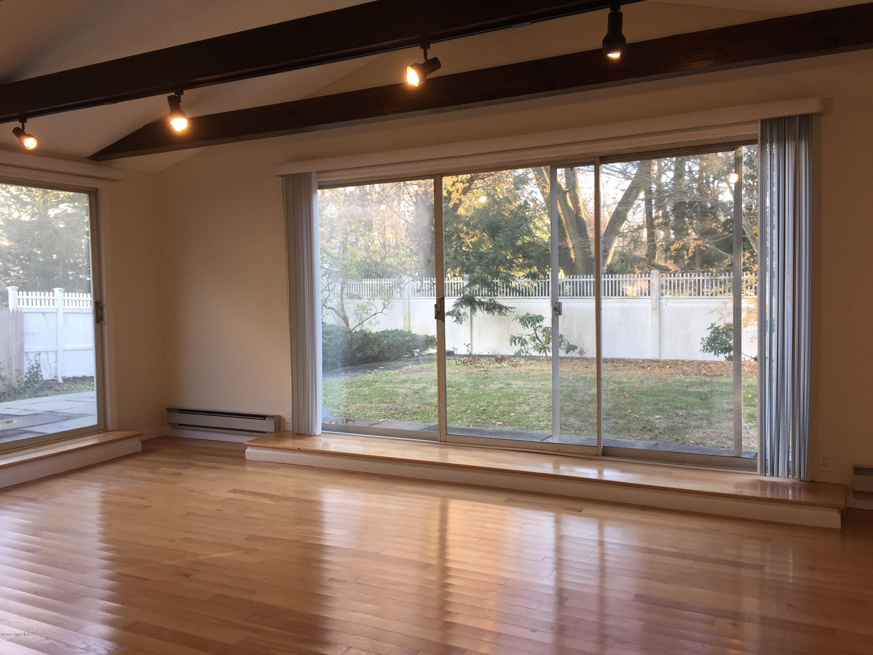 10 Miltiades Avenue Riverside, CT 06878 - Photo 14 of 16 a view of empty room with wooden floor and fan