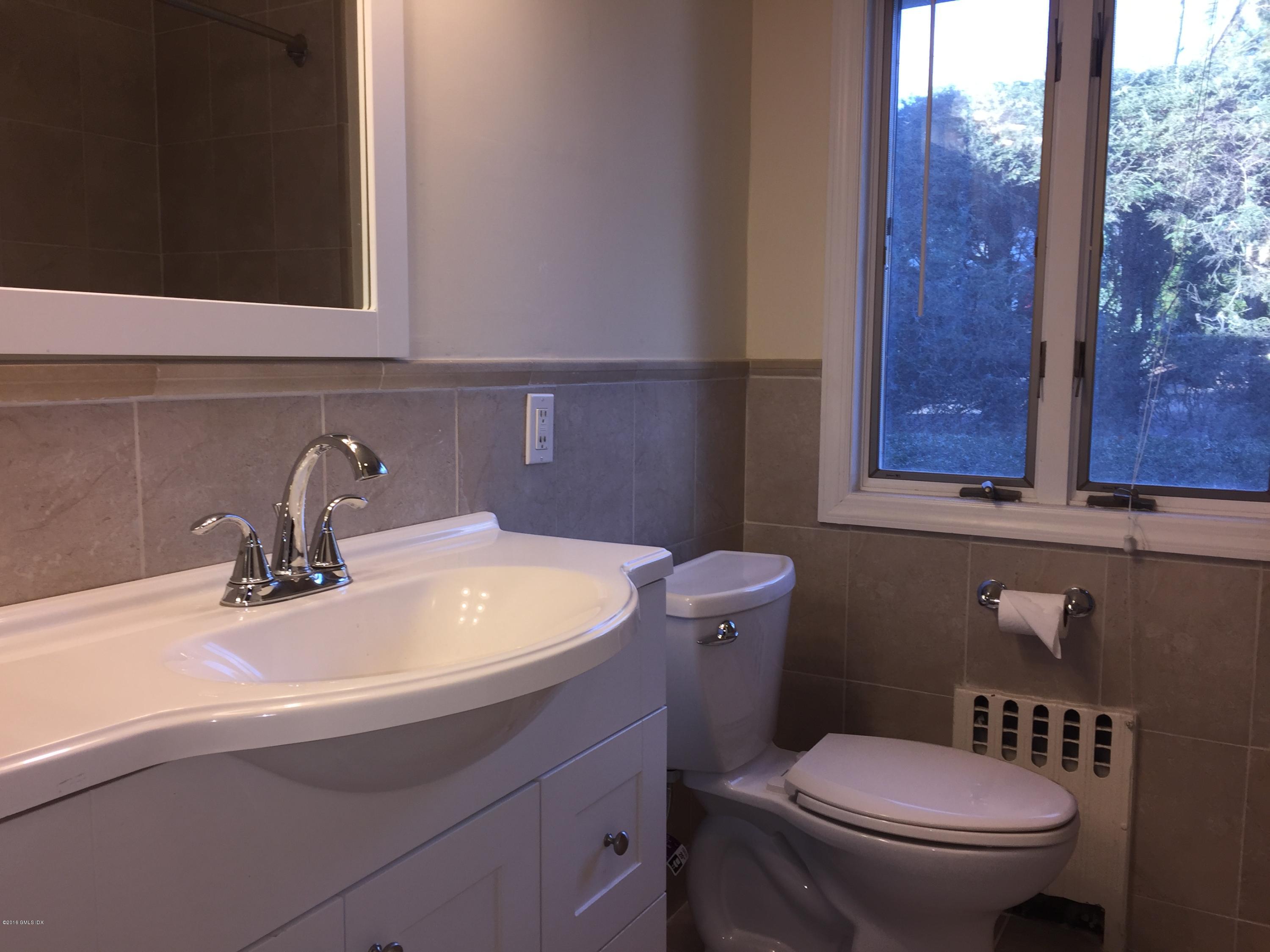10 Miltiades Avenue Riverside, CT 06878 - Photo 8 of 16 a bathroom with a sink and a toilet