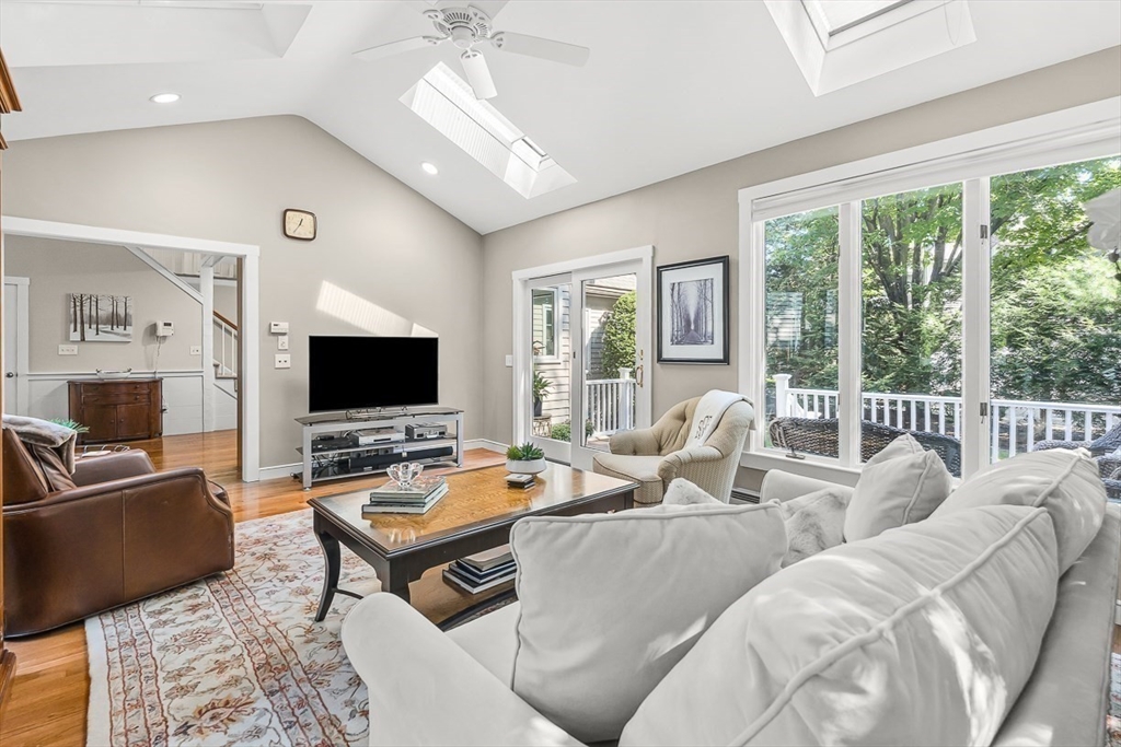 19 Louis Drive Wellesley, MA 02481 - Photo 16 of 30 a living room with furniture and a flat screen tv