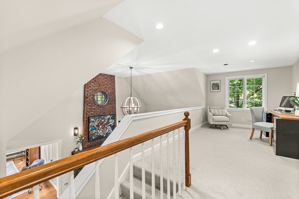 19 Louis Drive Wellesley, MA 02481 - Photo 17 of 30 a living room with furniture and a large window