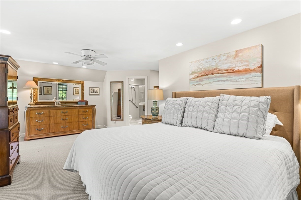 19 Louis Drive Wellesley, MA 02481 - Photo 19 of 30 a spacious bedroom with a bed and ceiling fan