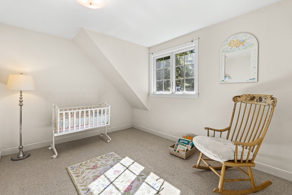 19 Louis Drive Wellesley, MA 02481 - Photo 22 of 30 a room with a chair and a window