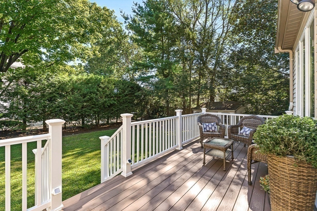 19 Louis Drive Wellesley, MA 02481 - Photo 27 of 30 a view of balcony with wooden floor and outdoor seating