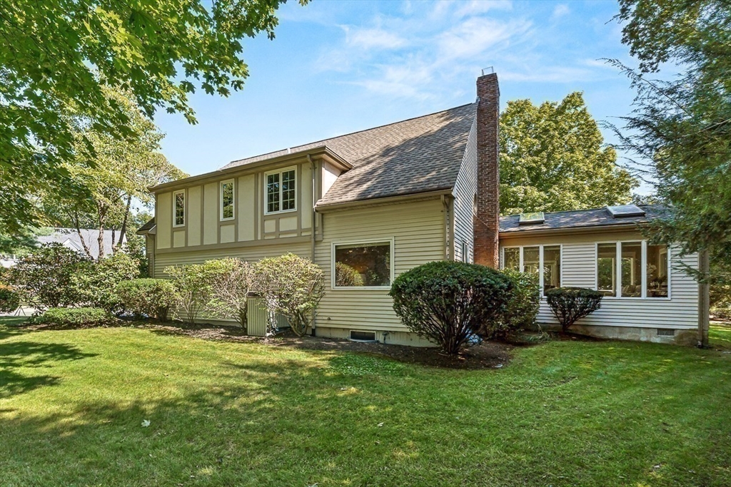 19 Louis Drive Wellesley, MA 02481 - Photo 29 of 30 a view of a house with backyard and garden