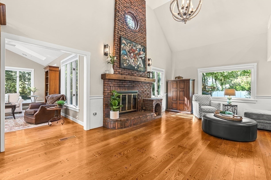 19 Louis Drive Wellesley, MA 02481 - Photo 9 of 30 a living room with furniture and a fireplace