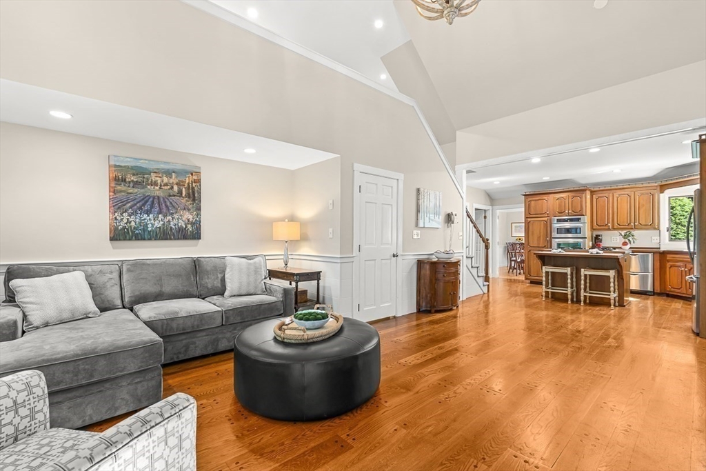 19 Louis Drive Wellesley, MA 02481 - Photo 10 of 30 a living room with furniture and kitchen view
