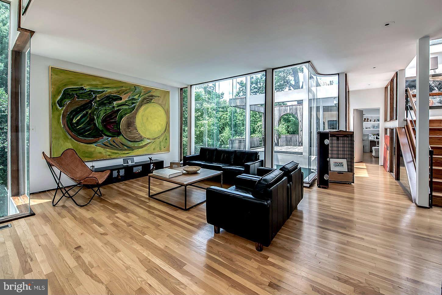 2724 Chain Bridge Road Northwest Washington, DC 20016 - Photo 11 of 30 a living room with furniture and a flat screen tv