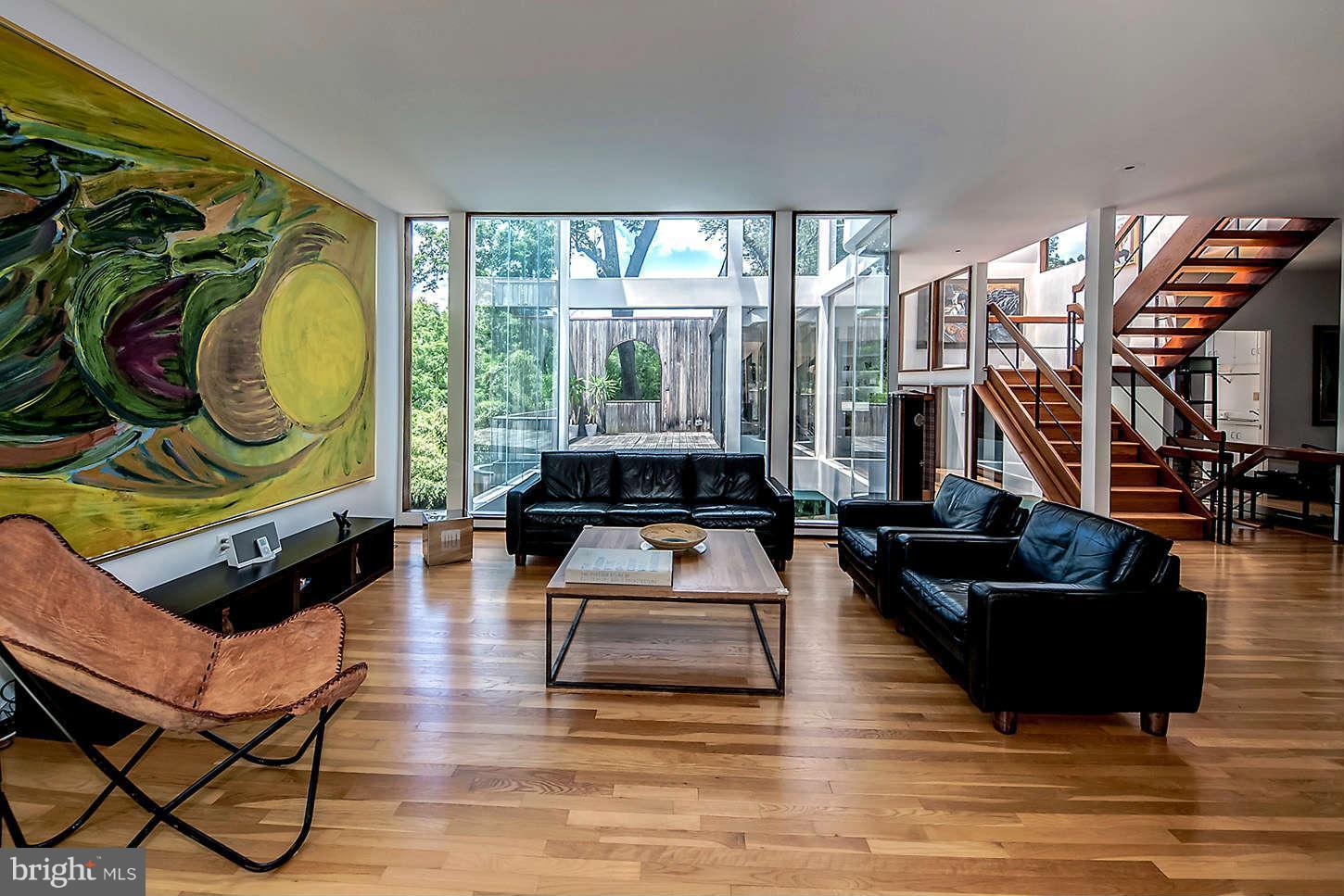 2724 Chain Bridge Road Northwest Washington, DC 20016 - Photo 14 of 30 a living room with furniture a rug and a floor