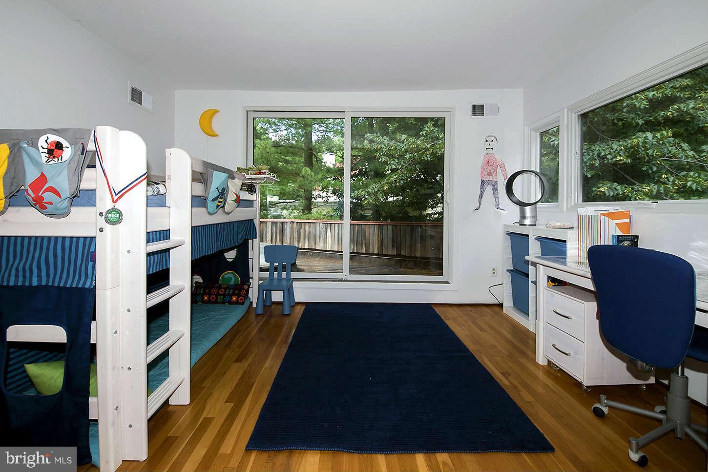 2724 Chain Bridge Road Northwest Washington, DC 20016 - Photo 19 of 30 a view of a workspace with furniture and a window