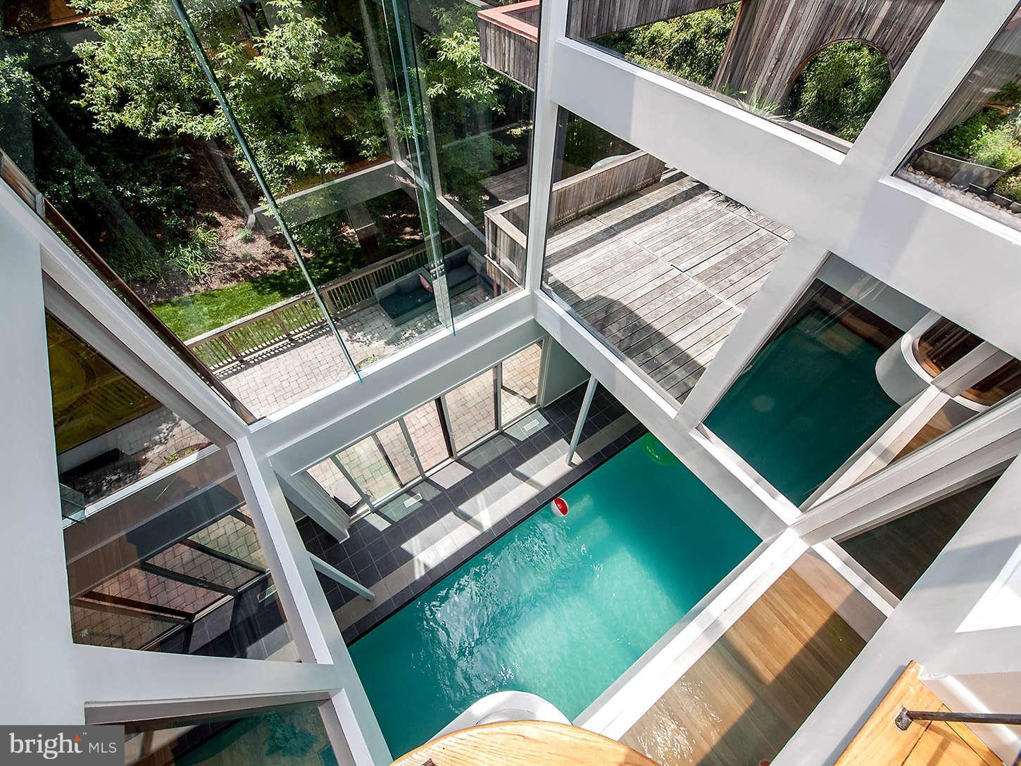 2724 Chain Bridge Road Northwest Washington, DC 20016 - Photo 23 of 30 a backyard of a house with seating space