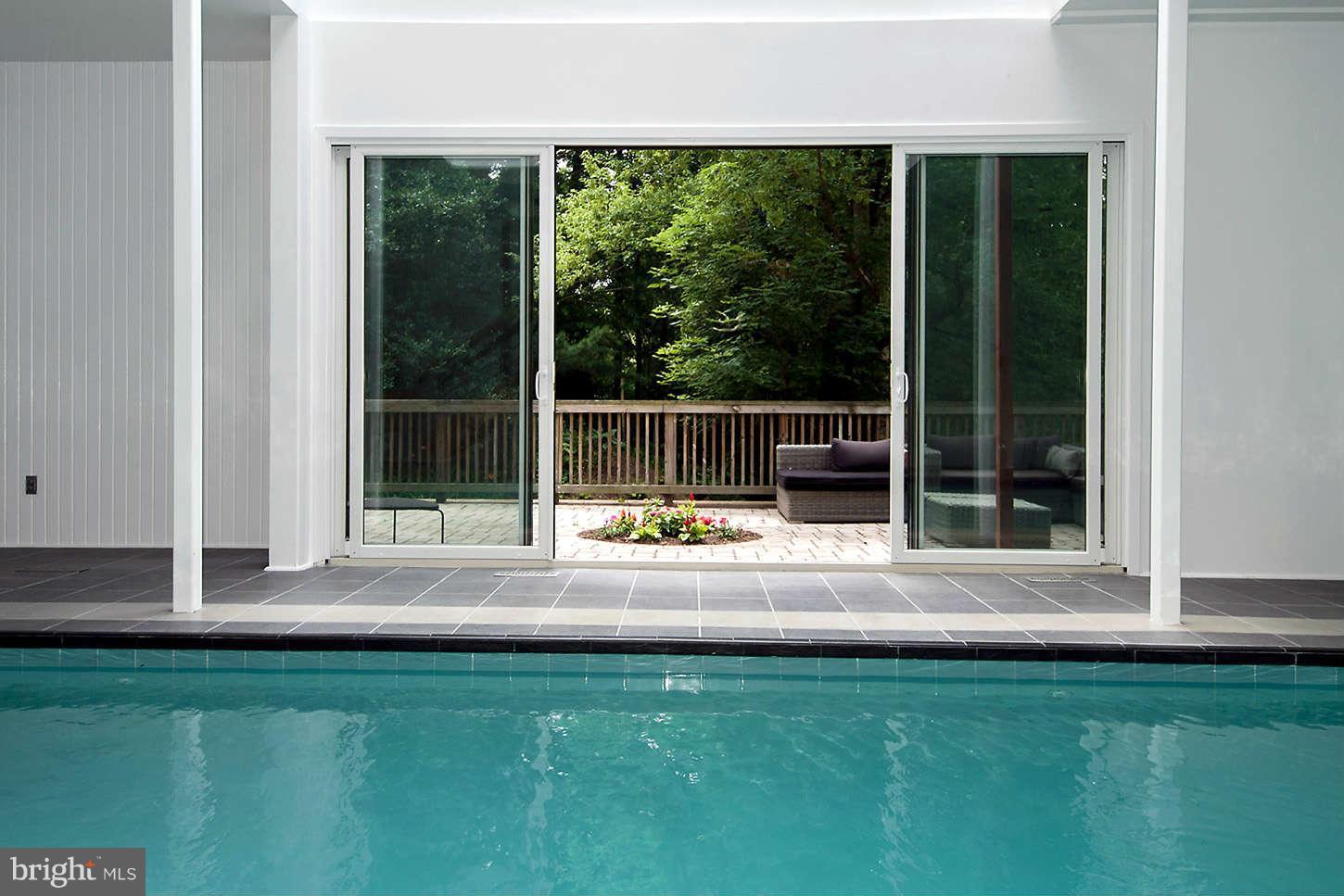 2724 Chain Bridge Road Northwest Washington, DC 20016 - Photo 24 of 30 a view of swimming pool with a yard
