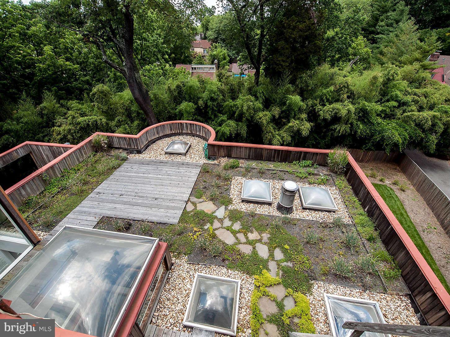 2724 Chain Bridge Road Northwest Washington, DC 20016 - Photo 25 of 30 a view of a balcony with two chairs