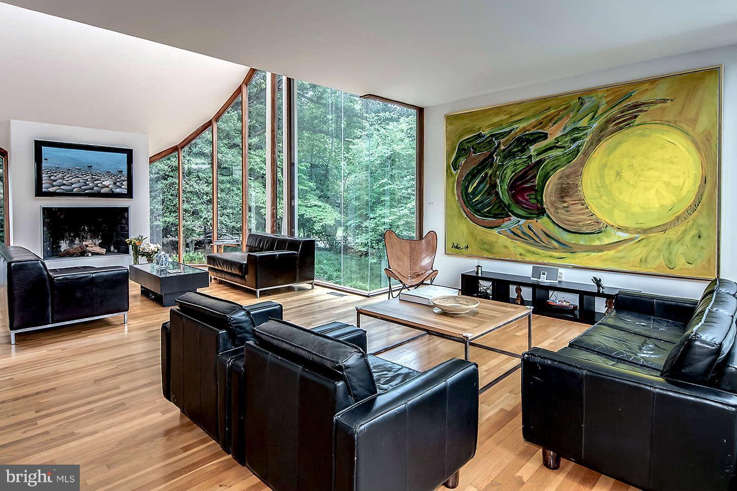 2724 Chain Bridge Road Northwest Washington, DC 20016 - Photo 10 of 30 a kitchen with stainless steel appliances granite countertop a stove a sink and a microwave