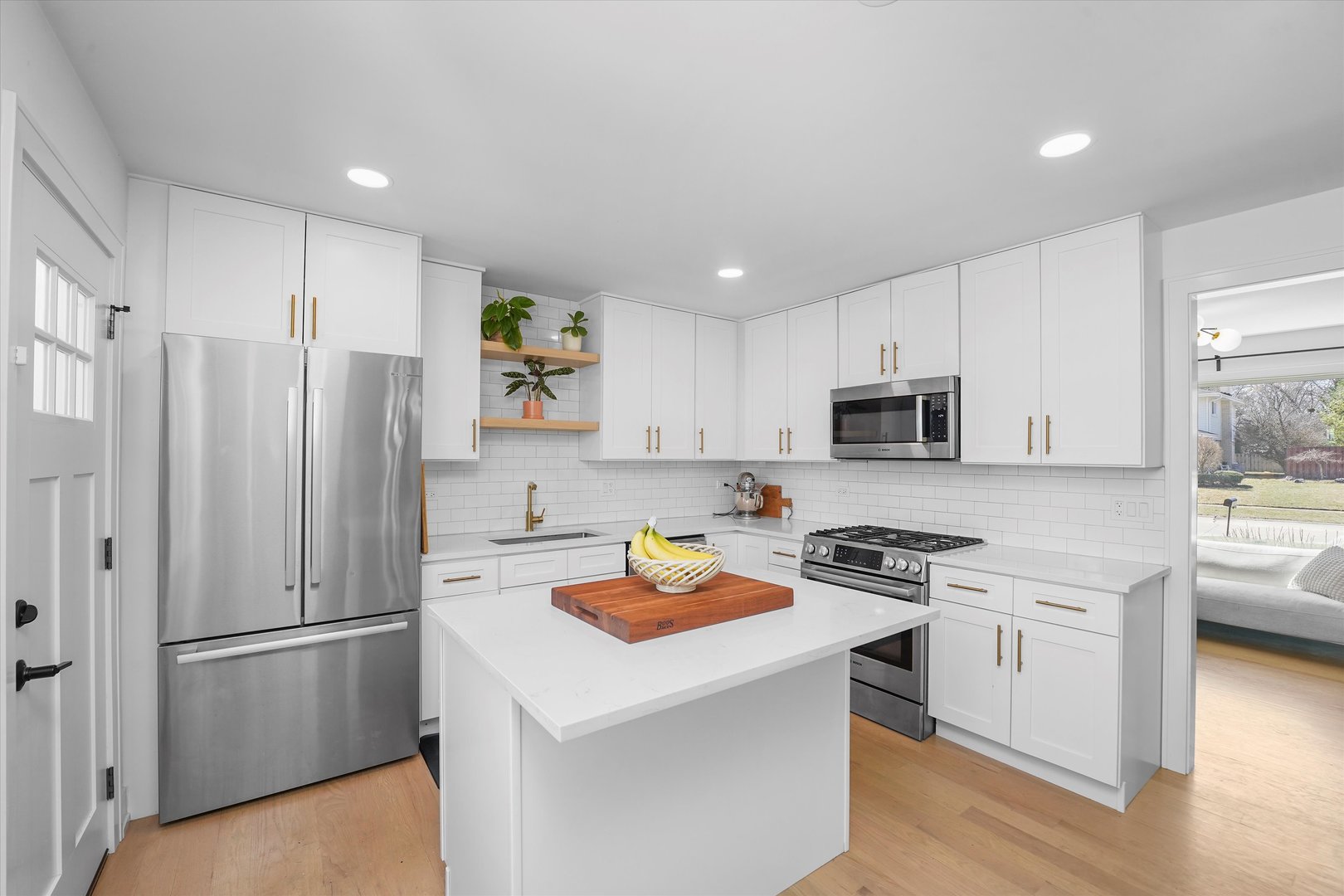 Undisclosed Address Northbrook, IL 60062 - Photo 14 of 46 a kitchen with stainless steel appliances a refrigerator sink and microwave