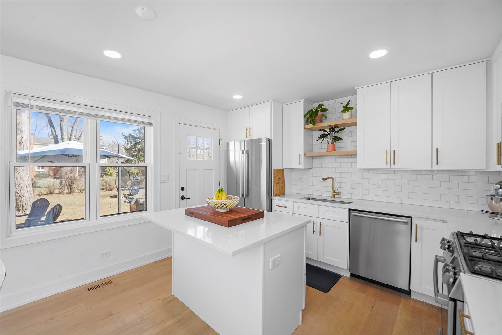 Undisclosed Address Northbrook, IL 60062 - Photo 15 of 46 a kitchen with a sink cabinets and window