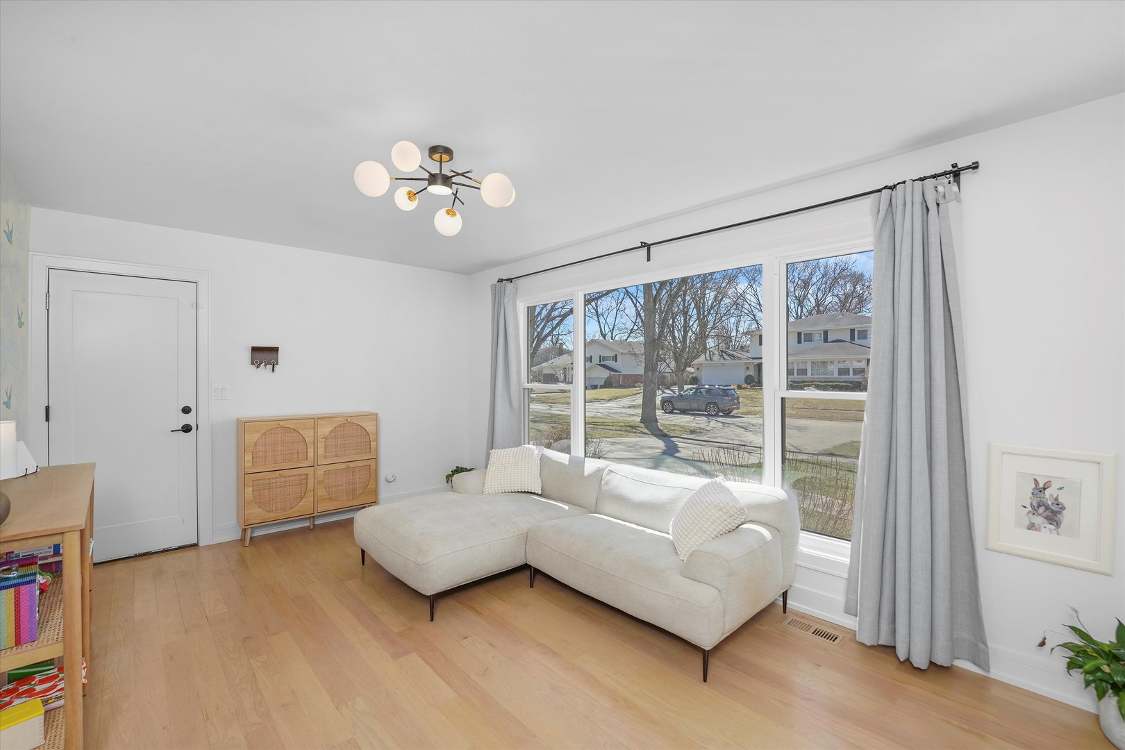 Undisclosed Address Northbrook, IL 60062 - Photo 19 of 46 a bedroom with furniture and a large window