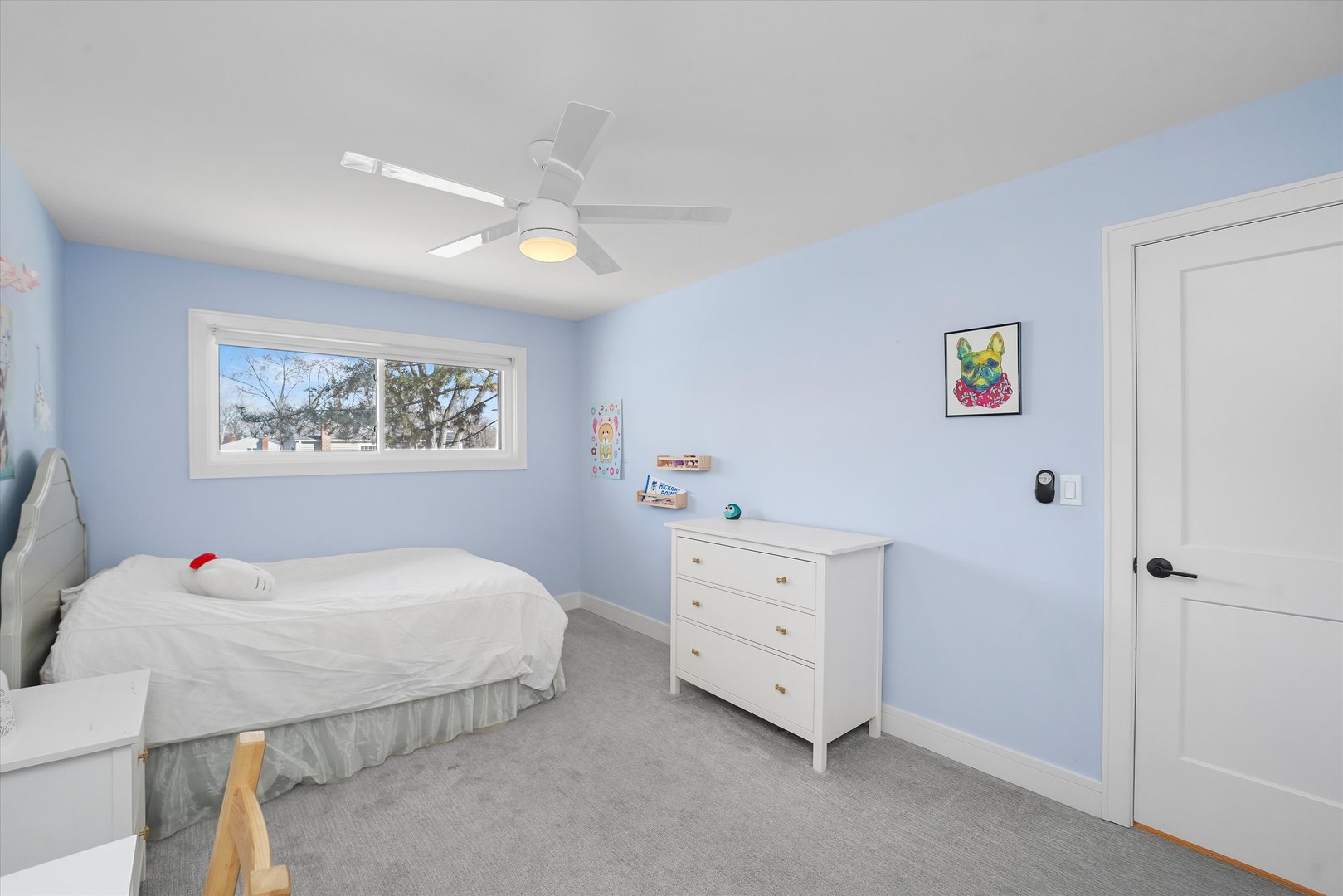 Undisclosed Address Northbrook, IL 60062 - Photo 31 of 46 a bedroom with a bed and a chandelier