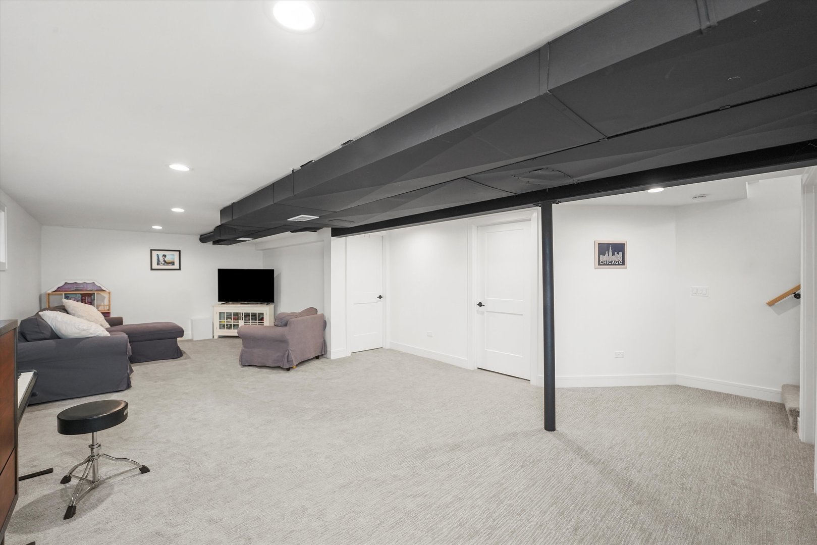 Undisclosed Address Northbrook, IL 60062 - Photo 33 of 46 a living room with furniture a flat screen tv and a window