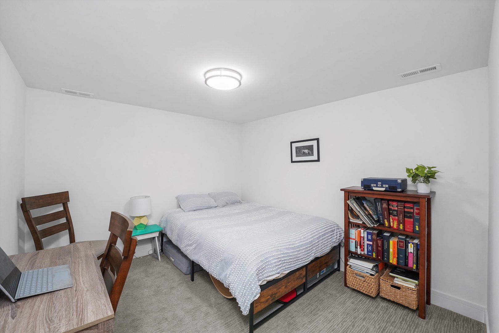 Undisclosed Address Northbrook, IL 60062 - Photo 37 of 46 a bedroom with a bed and a dresser