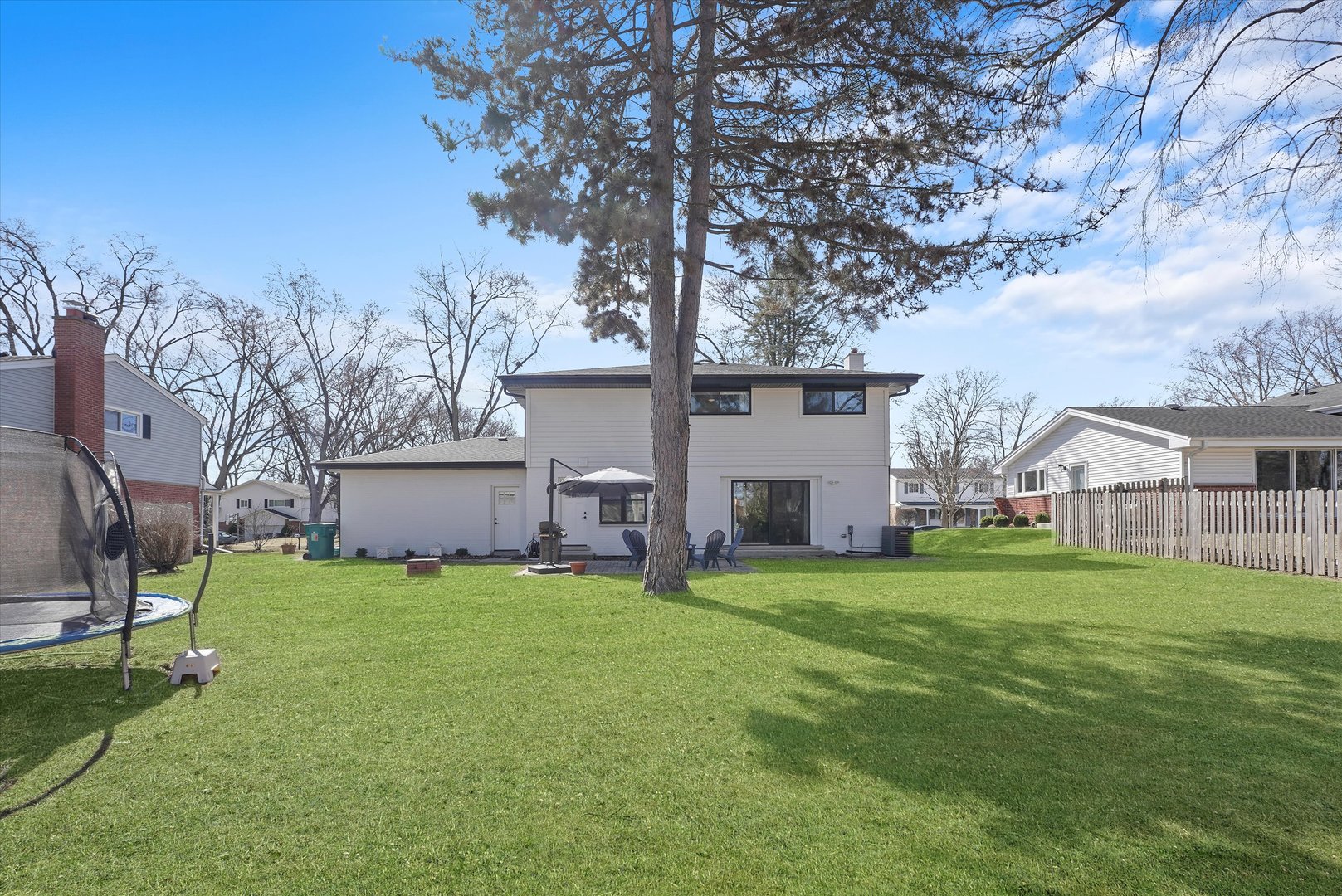 Undisclosed Address Northbrook, IL 60062 - Photo 5 of 46 a view of a house with a yard