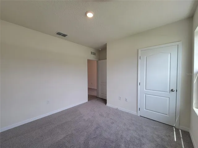 an empty room with an entryway
