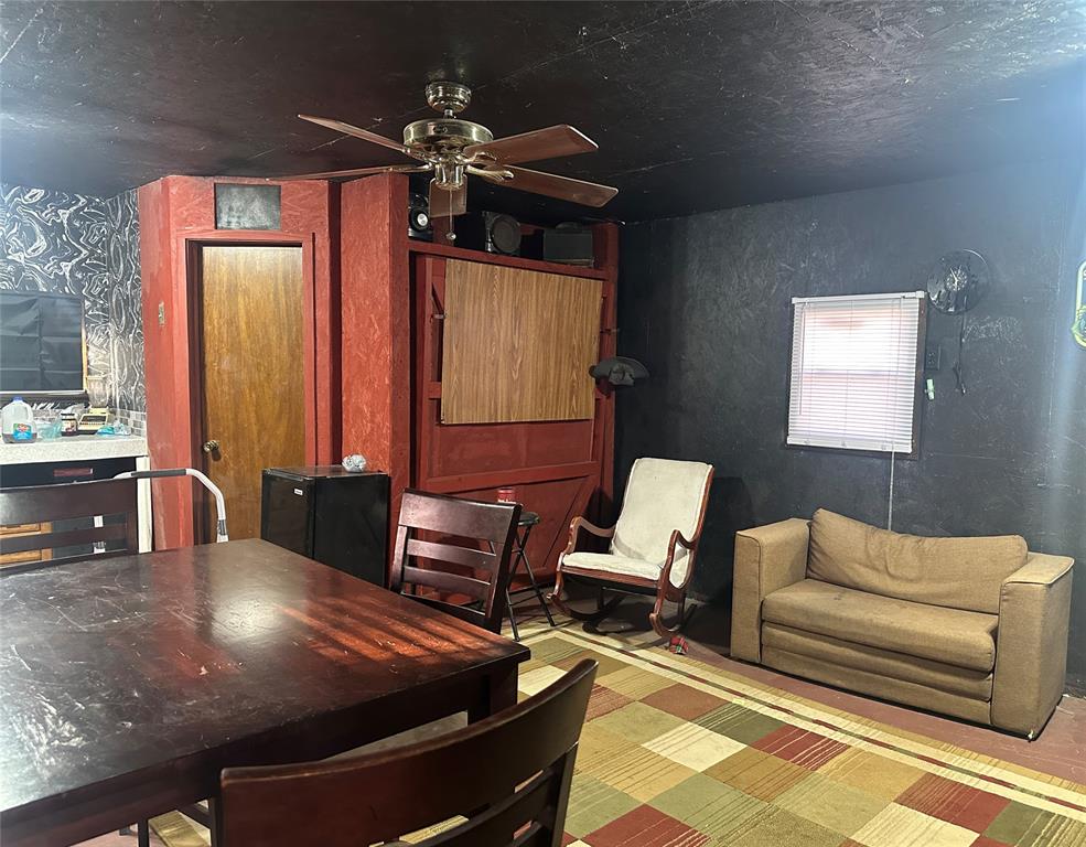217 Buffalo Comanche, TX 76442 - Photo 3 of 13 a living room with furniture and wooden floor