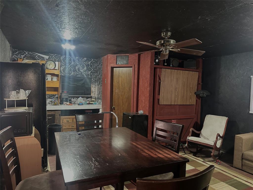 217 Buffalo Comanche, TX 76442 - Photo 4 of 13 a living room with furniture and wooden floor
