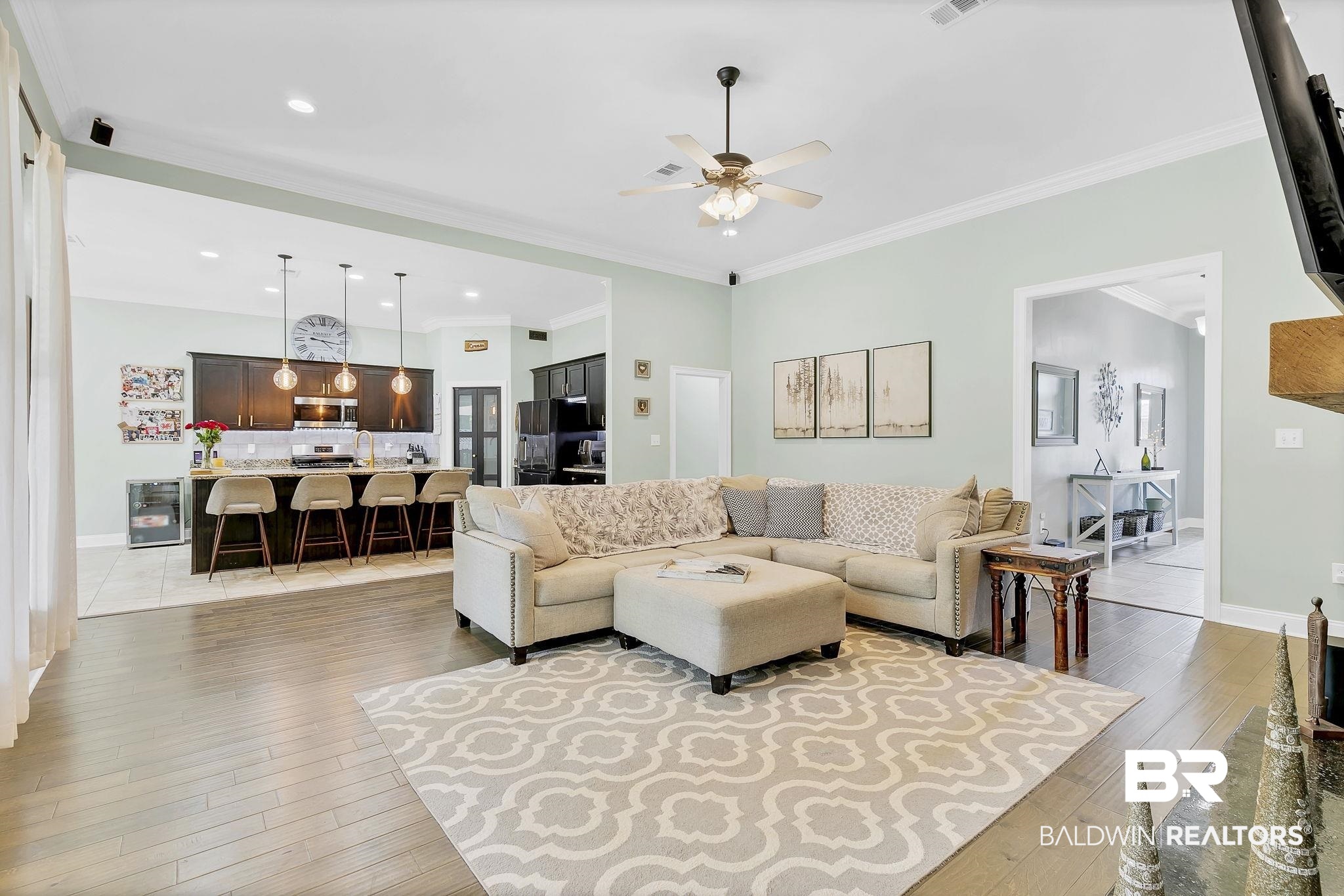 30635 Drayton Court Daphne, AL 36527 - Photo 11 of 51 Living room with ceiling fan, light wood-style flooring, crown molding, baseboards, and recessed lighting