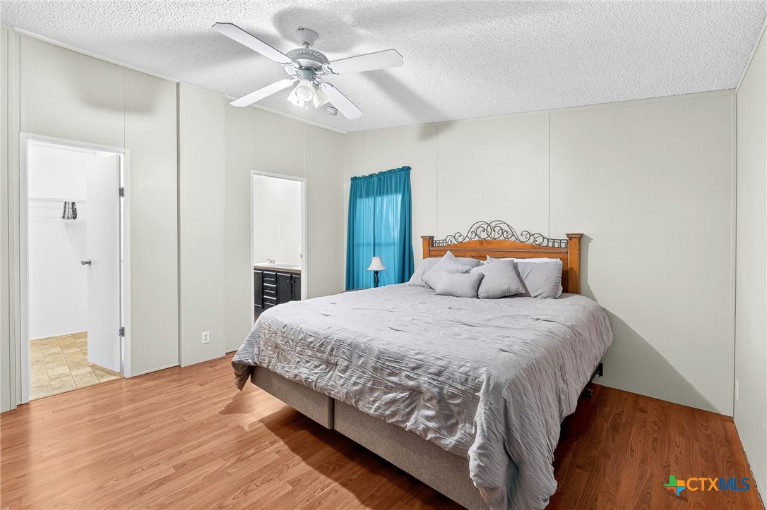 11213 Ridgewood Drive Salado, TX 76571 - Photo 12 of 24 a bedroom with bed and window