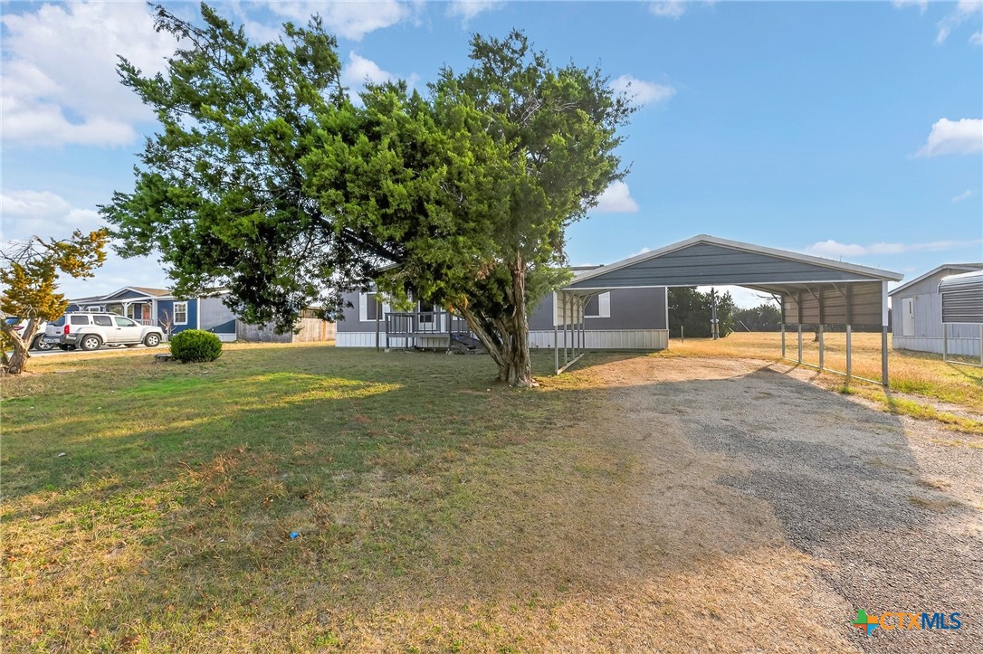 11213 Ridgewood Drive Salado, TX 76571 - Photo 2 of 24 a view of a house with a yard